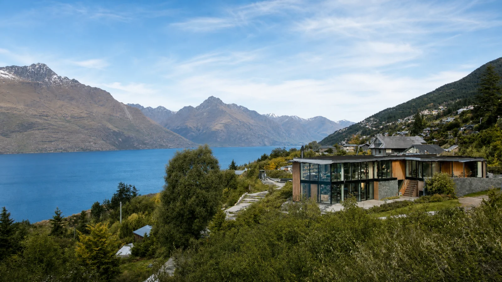 Contemporary Queenstown holiday home above Lake Wakatipu in clear daylight